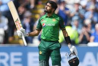 Babar Azam runs